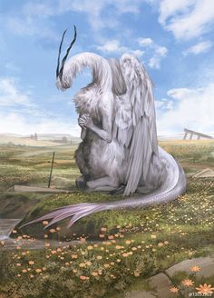 a white dragon sitting on top of a lush green field