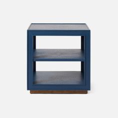 the side table is blue and has two shelves on each side, with one shelf open