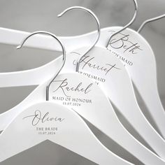 wedding hangers with names and date on them for the bride and groom to choose from