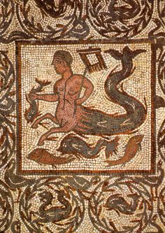 an ancient mosaic with a man riding a dragon