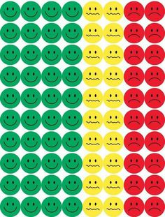 an image of different colored smiley faces on white and green, with red, yellow and green