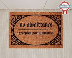 a door mat with the words no admittance on it