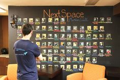 a man standing in front of a blackboard with pictures on it that says next space