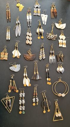 This listing is for ALL 31 pairs. The earrings are 100% handcrafted. **One of a kind made with brass, horn & bones. ^^These earrings ships through dhl express.  More earrings; https://www.etsy.com/shop/TribalTess?ref=seller-platform-mcnav§ion_id=21293980 Buy multiple items and pay shipping for ONE item ONLY. African Jewelry Diy, African Earrings Handmade, African Style Earrings, Brass Jewelry Handmade, African Jewelry Earrings, African Inspired Earrings, Pyramid Earrings, Afro Jewelry, African Beaded Bracelets