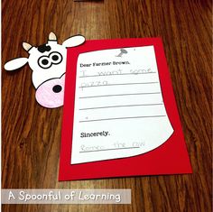 a paper cow is next to a piece of paper that says, dear farmer brown