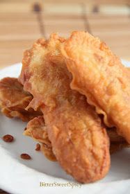 some fried food is on a white plate