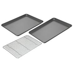 two baking pans and a grid on a white background