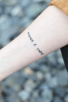 a person with a tattoo on their arm that says, i wish a trip is here