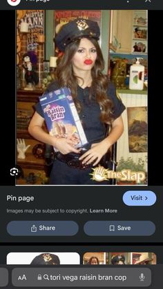 the girl is wearing a police uniform and holding a book in her hand, while she has