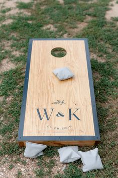 a cornhole board with the word w & k written on it