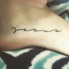 a woman's foot with the word jerem written in cursive font