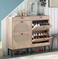 a wooden cabinet with shoes on it in a room next to a chair and stairs