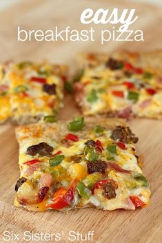 four slices of pizza sitting on top of a wooden cutting board with the words easy breakfast pizza