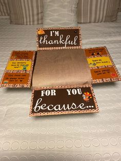 the bed has been decorated with thanksgiving cards