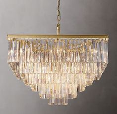 a gold chandelier hanging from a ceiling