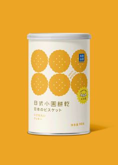 a can of food on an orange background with the word's written in japanese