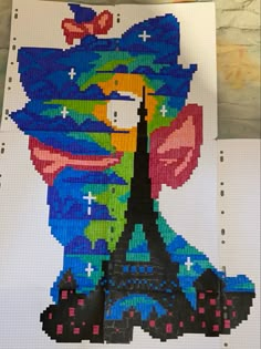 an image of the eiffel tower made out of legos on a sheet of paper