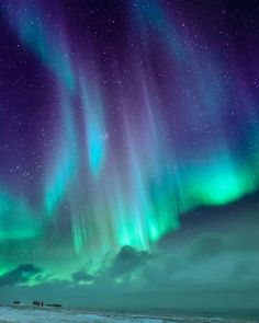 the aurora bore is shining brightly in the sky