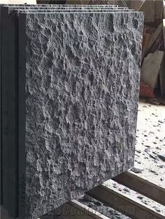 the side of a building that is made out of concrete