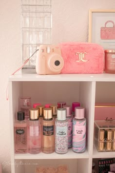 a white shelf filled with lots of cosmetics and personal care items on top of it