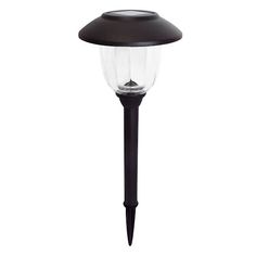 a black post light with clear glass on the top and one light on the bottom