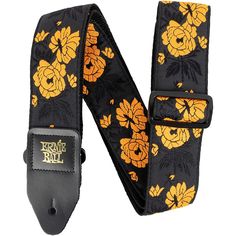 a black and yellow belt with flowers on it