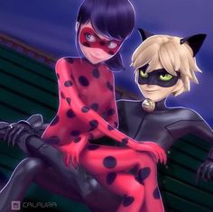 two cartoon characters dressed in black cats and red polka dots, one with green eyes