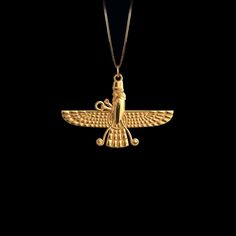 Discover our gold Faravahar pendant, a masterpiece of ancient Persian symbolism. This solid gold Faravahar necklace embodies Zoroastrian heritage and spirituality. Perfect for those seeking a meaningful connection to Persian culture and faith. PENDANT INFORMATION This pendant is made of real, solid gold.• Made in USA• Material: 14k or 18k solid gold• Finish: polished• Width: 1.5" (38 mm) x Height: 1" (26 mm)• Pendant weight: approx. 5 grams (14k)• Bail: fits up to 4 mm chains• Solid back, not ho Persian Necklace, Ahura Mazda, Paris Wallpaper, Ancient Persian, Persian Culture, Solid Gold Chains, Yellow Gold Pendants, Elegant Jewelry, Gold Finish