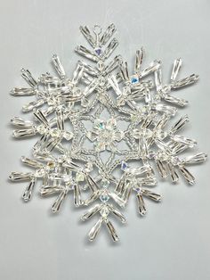 a snowflake made out of crystal stones