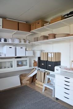 a room filled with lots of shelves and boxes