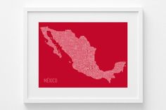 a framed map of mexico with the names and cities in grey on a white wall