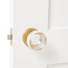 an open door with a glass knob on it