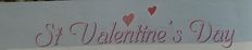 a sign that says st valentine's day on it