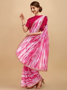 Pink and white sareeTie and dye dyed saree with embroidered borderThe saree comes with an unstitched blouse pieceThe blouse worn by the model might be for modelling purpose only. Check the image of the blouse piece to understand how the actual blouse piece looks like. Pre-draped Bandhani Print Saree, Pre-draped Bandhani Saree In Traditional Drape, Semi-stitched Cotton Saree With Bandhani Print, Semi-stitched Lehenga With Border, Wedding Cotton Saree With Bandhani Print, Unstitched Saree For Navratri, Diwali Blouse Piece With Border, Festive Pre-draped Saree With Printed Border, White Saree With Border For Navratri