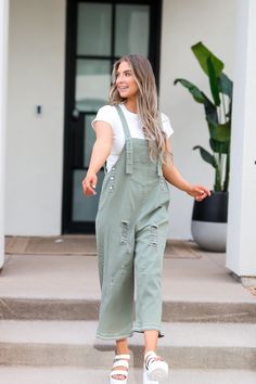 Introducing the Frankie Denim Overalls in Sage. Designed with adjustable straps, an oversized fit, and distressed details, these sage green bib overalls offer both style and comfort. The wide leg pant gives a trendy touch, making them a must-have for any fashion-forward individual. Model Measurements: Hips 40.5” Waist 27.5” Bust: 34”, Height 5’7.5, wearing a size small Material: 100 Cotton Measurements XS: Hips: 42"| Length: 44" (taken from top of front of overalls to ankle cuff) S: Hips: 42"| L Green Fall Overalls With Pockets, Green Relaxed Fit Overalls For Spring, Spring Green Relaxed Fit Overalls, Spring Khaki Cotton Overalls, Casual Green Jumpsuits And Rompers With Suspenders, Trendy Green Overalls With Pockets, Spring Green Jumpsuits And Rompers With Suspenders, Trendy Green Cotton Overalls, Spring Green Overalls With Suspenders