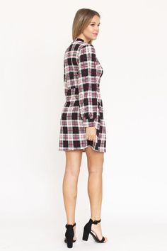 High Neck Plaid Sheath DressLooking for a versatile and stylish dress that can take you from the office to a date night? Look no further than our High Neck Plaid Sheath Dress! This flattering dress is made from a polyester-spandex blend, so it's both comfortable and figure-hugging. The high neckline and plaid print give it a touch of sophistication, while the shorter hemline keeps it fun and flirty. Pair it with heels and a blazer for a polished work look, or dress it down with flats and a denim High Neck Mini Dress, Curvy Swimwear, High Neck Designs, Black Sheath Dress, Bishop Sleeve, Flattering Dresses, Brown Plaid, Work Looks, Plus Size Dress