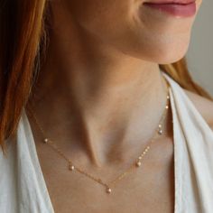 5 sweet little freshwater pearls beautifully anchored on our favorite chain. A classic and simple necklace to wear alone or layer. DETAILSAvailable in 14k Gold Fill or Sterling SilverChoose from 14", 16" or 18” lengths with 1" extender for the clasp.Hypoallergenic and water-proof Simple Bridal Necklace, Gold Bridal Necklace, Bridal Pearl Necklace, Bridal Pearls, Bridal Necklace, Simple Necklace, Gold Pearl, Water Proof, Cute Jewelry