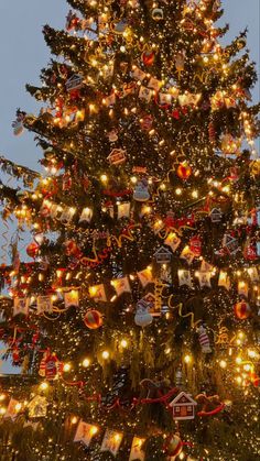 a christmas tree with lights and ornaments on it