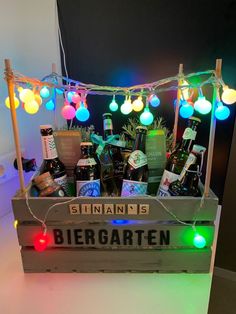 a crate filled with beer bottles and lights