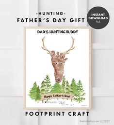 a father's day gift with a deer head and pine trees on the front