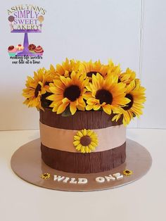 there is a cake with sunflowers on it