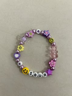 Olivia Rodrigo’s album “SOUR” inspired beaded bracelet. Bead Kandi, Tiny Bead Bracelet, Pony Bead Projects, Make The Friendship Bracelets, Art Bracelet, Diy Beaded Bracelets