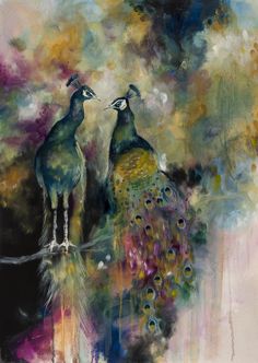 two peacocks sitting on top of a tree branch in front of a sky filled with clouds