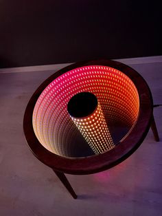 a round table with a lit object on it