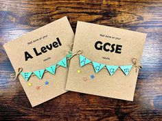 two cards with the words a level gcse on them, tied together and placed next to each other