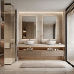 a modern bathroom with two sinks and large mirrors on the wall, along with a walk - in shower