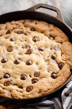 a chocolate chip cookie in a cast iron skillet