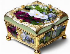 an elaborately decorated box with flowers on it's sides and gold trimmings