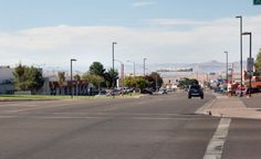 an intersection with traffic lights and street signs