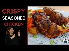 a woman pointing at some food on a plate with the words crispy seasoned chicken